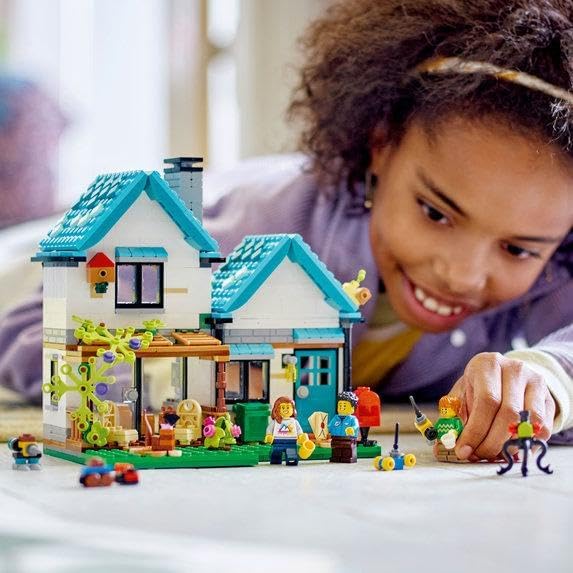 LEGO Creator 3 in 1 Cozy House Building Kit Rebuild into 3 Different Houses Includes Family Minifigures and Accessories